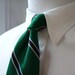 Vintage Hand Sewn Finest Silk 3" Skinny Trad / Ivy League Neck Tie with Navy Blue & White Repp Stripes on a Green Background. Made in USA.