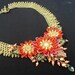 Tangerine Summer Bloom beaded necklace in Orange, Yellow, Red and Green