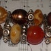 Chunky Brown, gold and rust interchangeable watch band.