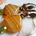 clamshell earrings. caramel earrings beach jewellery.