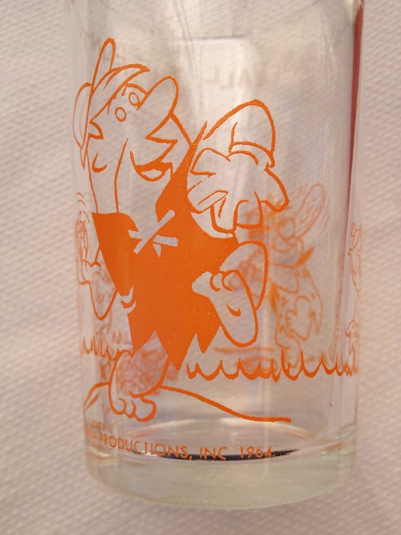 A Flintstones Drinking Glass Wit