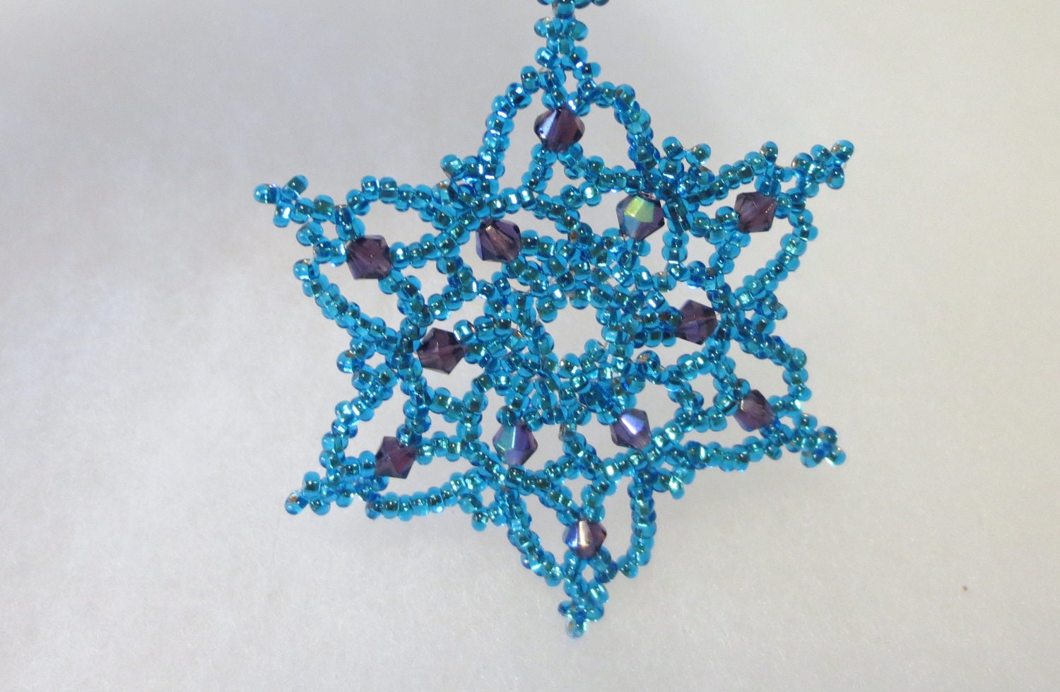 Bead and crystal snowflake / wreath ornament.