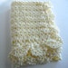 Crochet cream unisex baby blanket handmade crocheted in a lacy pattern with scalloped edging baby afghan