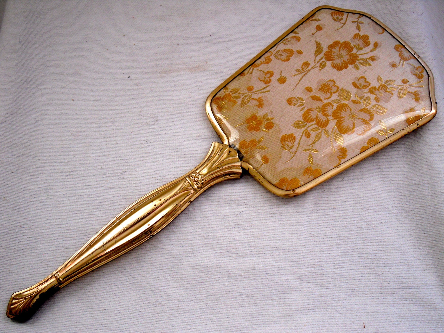 Charming Vintage Hand Mirror in Gold With Floral Design