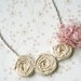 Triple Cream and Pink Rosette Bib Necklace with Pink Flower