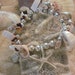 Sea Treasure - Marbled seahells with silver beads and silver starfish 2012007