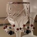 Hoop in hoop garnet and black onyx earrings