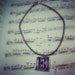 Purple Alto Clef Necklace