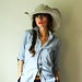 eco cowboy hat. hand crochet bamboo silk yarn. color clay. one size. lace wire brim. made to order