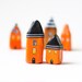 Little Halloween clay houses - orange and black with tiny ghost in the window
