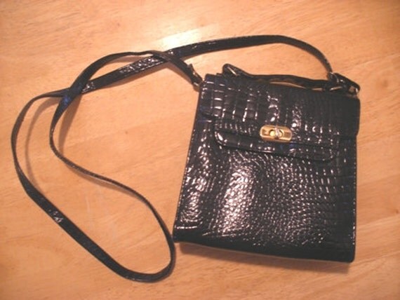 black vinyl crossbody bag