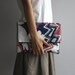 Needlepoint clutch / explosion