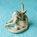 White Cat Cleaning Ceramic Sculpture