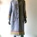 60s blue and white nubby wool coat in chic snowstorm tweed w/ colorful woven cuff and collar trim - size 6/8 - purple satin lining -