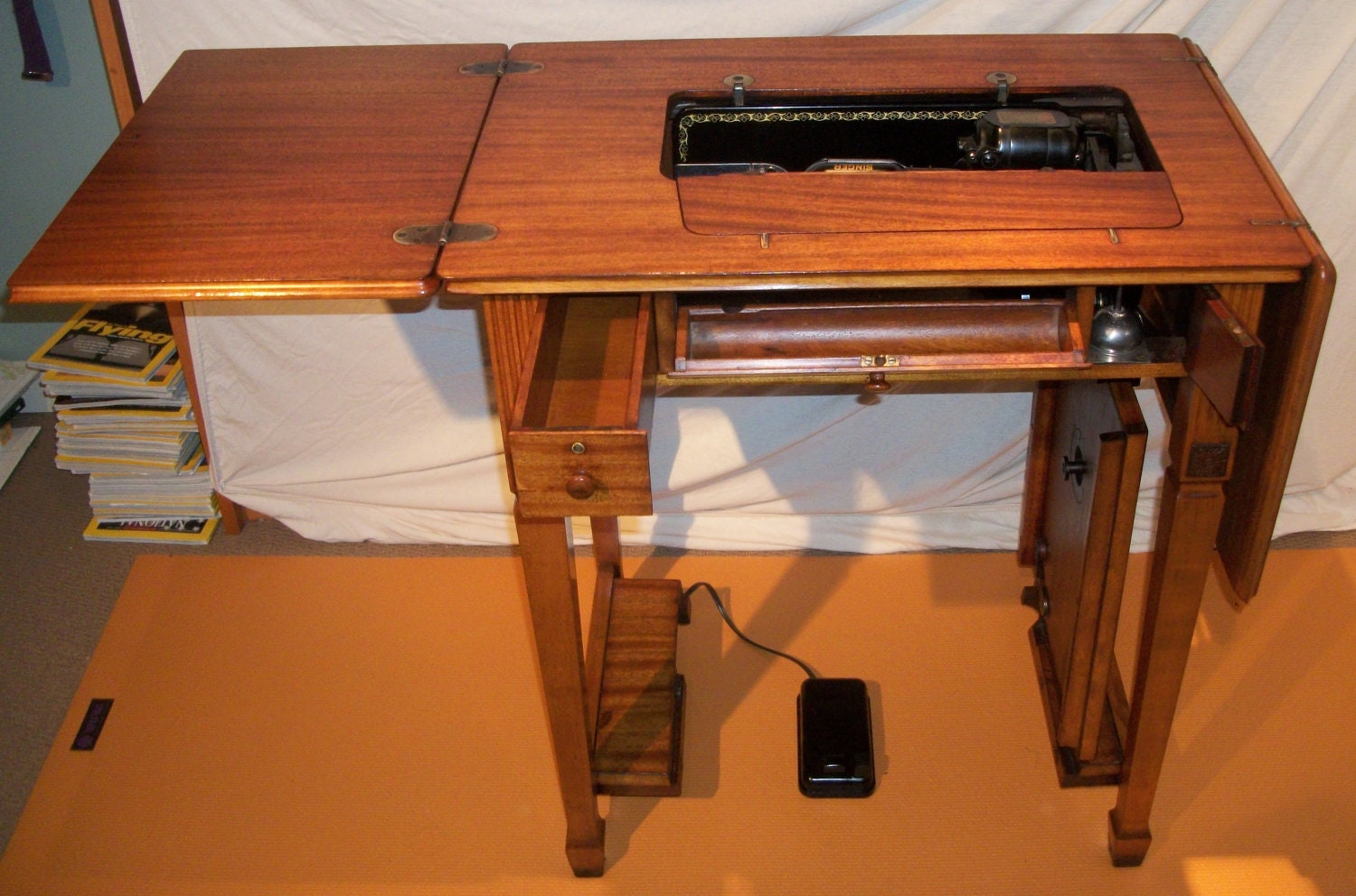 Singer sewing machine deluxe library table