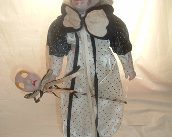 vintage musical clown with stand play send in the clowns