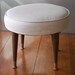 Round Beige Danish Modern Splayed leg Foot Stool