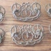 Matched set of 6 lg fancy cast brass antique/vintage drawer pulls 3 inch centers