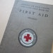 antique Red Cross FIRST AID book - circa 1925