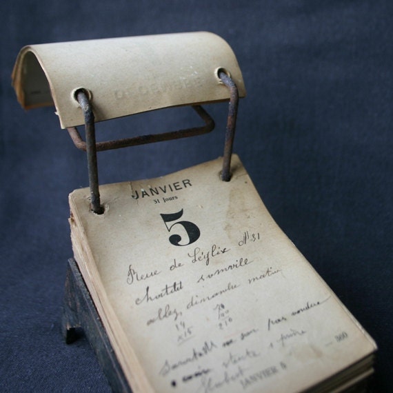 Antique used industrial desk calendar.