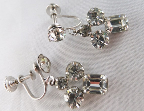 Vintage jewelry earrings in screw backs in silver tone and