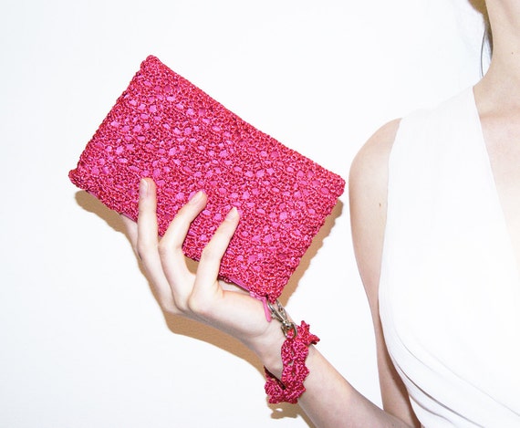 https://www.etsy.com/listing/114397496/fuchsia-pink-crochet-clutch-bag-handmade?ref=shop_home_active_5