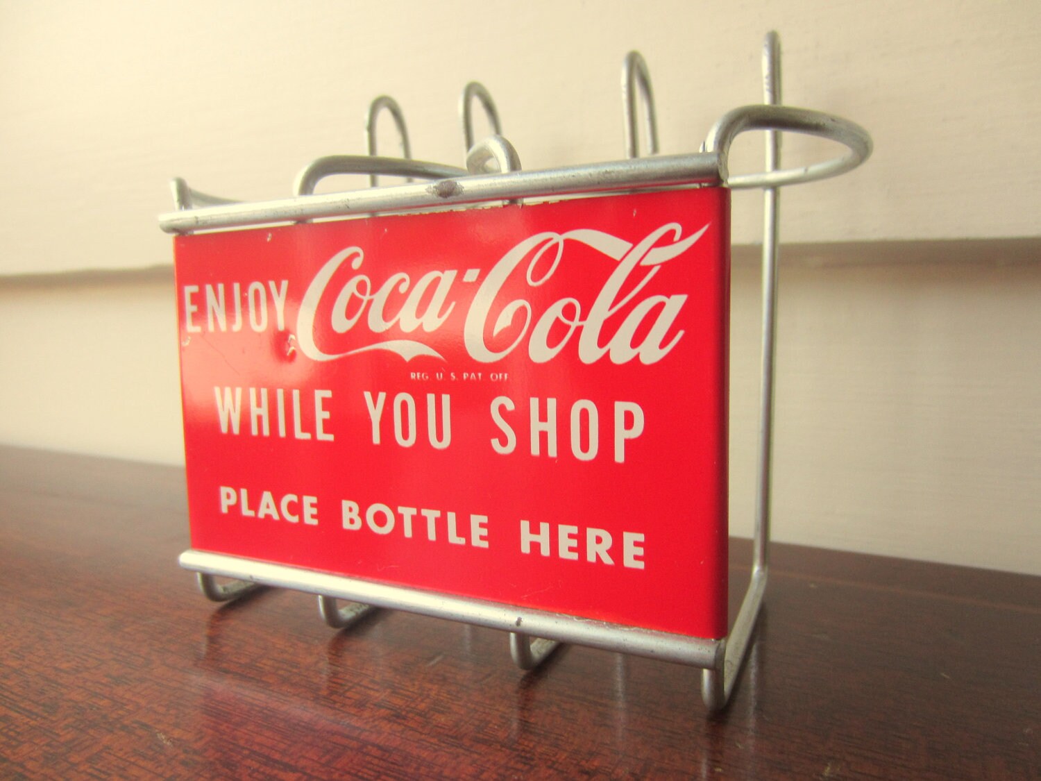 Coca cola bottle holder for shopping cart. 1950s coca cola