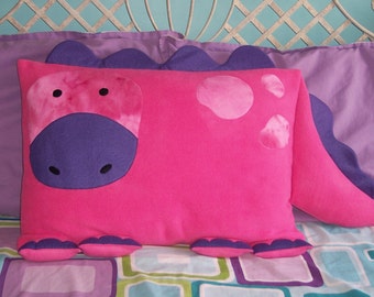 pink dinosaur pillow