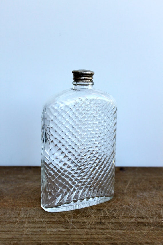 Universal 1927 vintage glass flask by Brimfieldfinds on Etsy