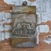 Vintage brass notebook holder.