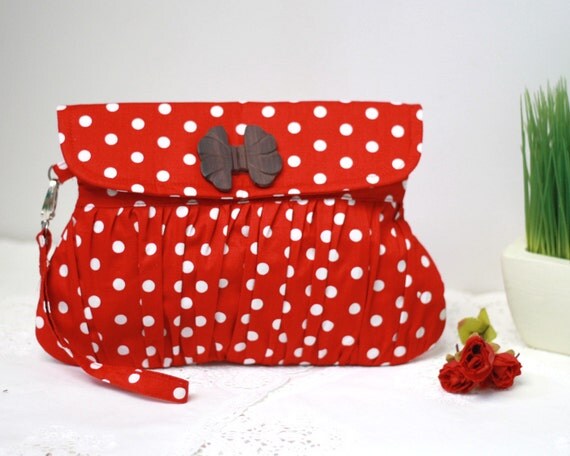 red and white clutch bag