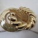 White Elastic Belt With A Gold Tone Belt Buckle c.1970