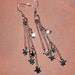 Star dangle earring