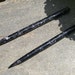 Hairsticks with black and silver shimmering .54.