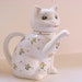 small porcelain cat