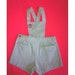 JUMPSUIT pair of shorts ( size 5 ans )