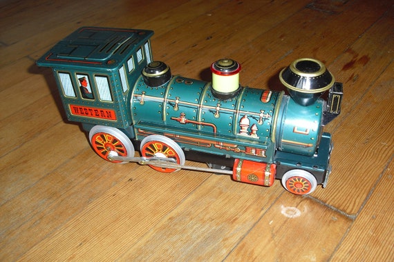 Vintage Battery Operated Tin Toy Train by dragonflyonbeacon