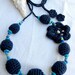 Crochet beads necklace with ring in navy blue, turquoise, green