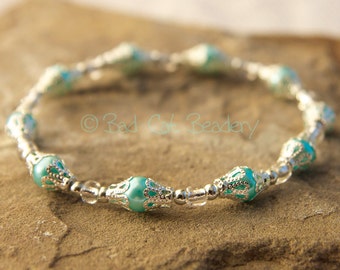 Silver Blue Stretch Bead Stack Bracelets in Shimmery Iridescent Blue, Silver