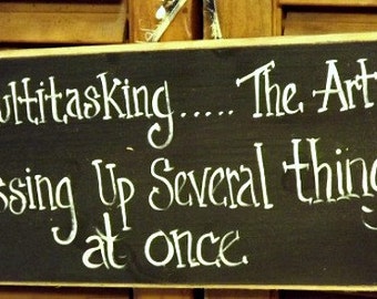 Funny wood sign about multitasking