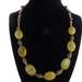 statement necklace, dyed yellow jade beads, oval beads, gold spacer beads, magnetic clasp