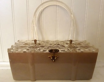Taupey Salmon Lucite Purse with Heavily Carved Top, 3-Ball Brass Catch & Double Handle, ca 1950s