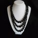 vintage black glass necklace.......58