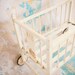 antique doll crib with wheels