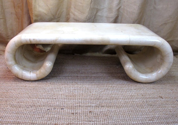 A Lacquered Goatskin Scroll Form Coffee Table