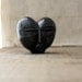 v i n t a g e carved stone heart face