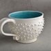 Spiky Mug: White and Caribbean Blue Dangerously Spiky Cocoa/Soup Mug by Symmetrical Pottery