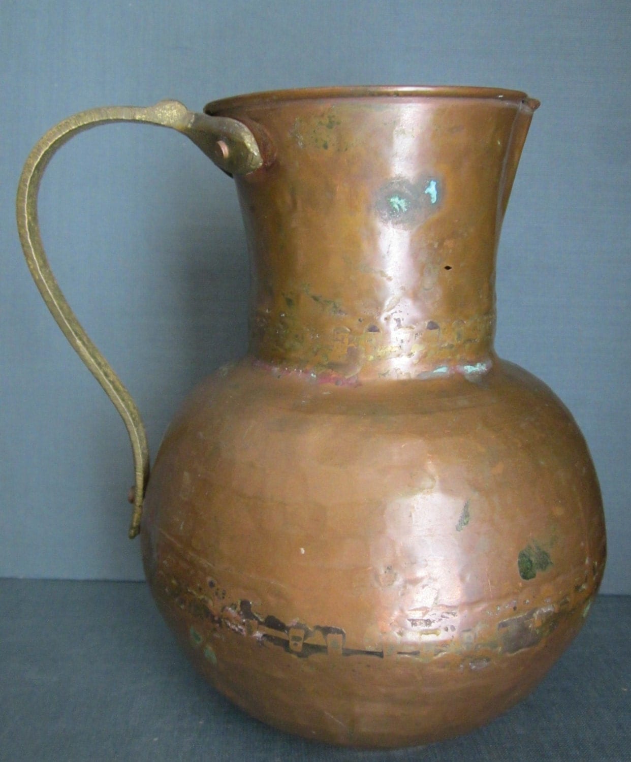 Hammered Copper Pitcher with Brass Handle Made by WhatsOnTheShelf