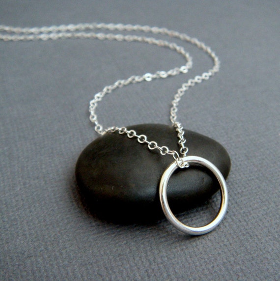 silver ring necklace. large sterling silver circle. simple.