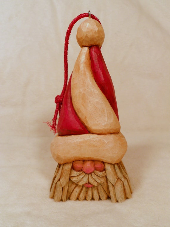 hand carved wooden santa christmas ornament with candy cane hand carved wooden santa christmas ornament with candy cane
